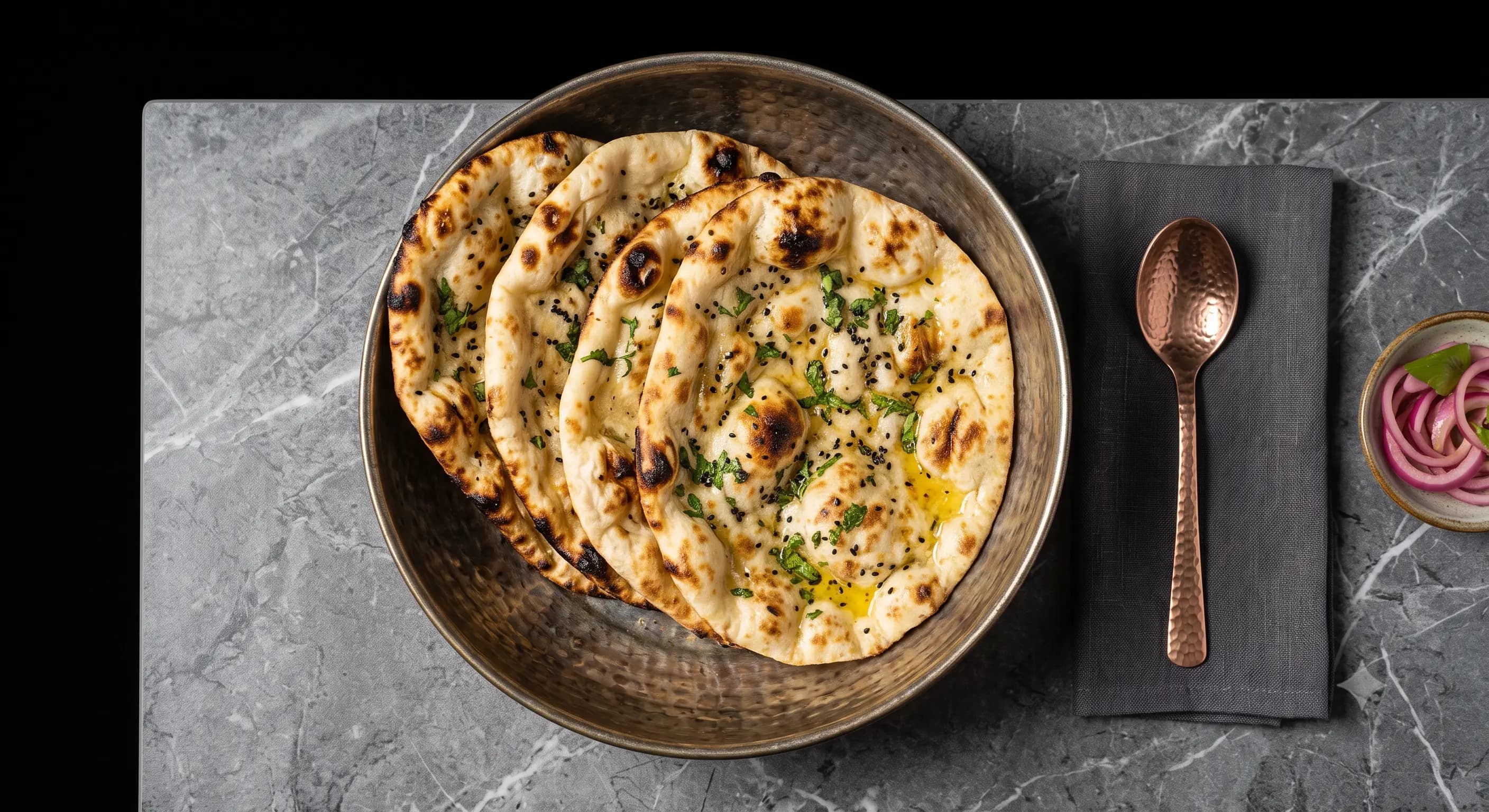 Butter Naan in a dark bowl